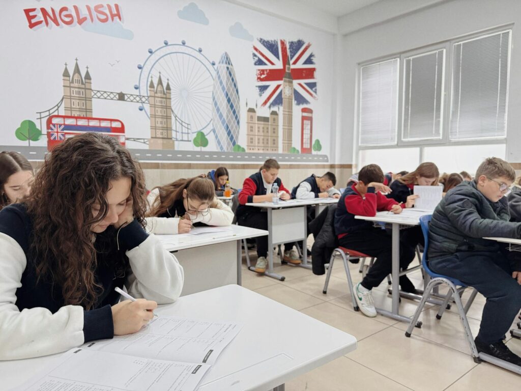 students in classroom with london theme decor